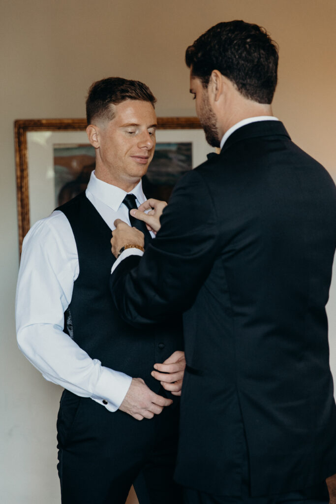 Groom getting ready for his diamond mills wedding