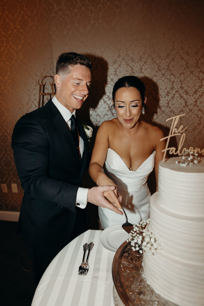 Cake cutting at new york wedding venue diamond mills