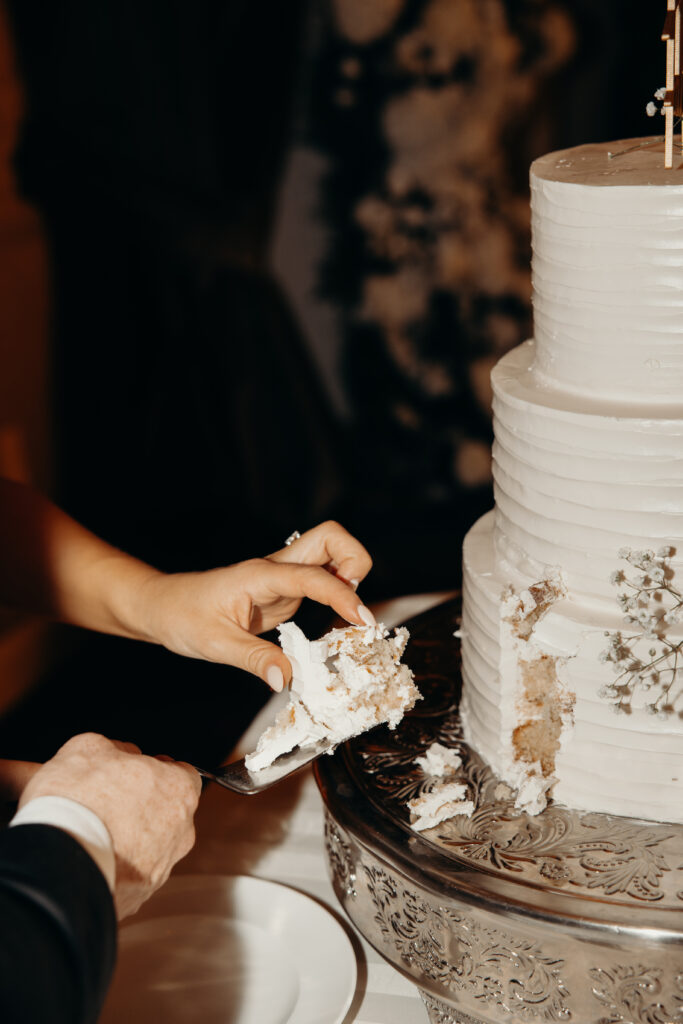 Cake cutting at new york wedding venue diamond mills