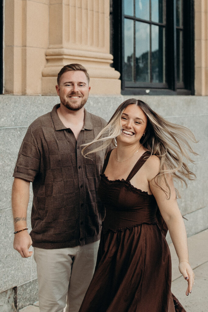 Engaged couple photographed at jersey shore by a brooklyn wedding photographer