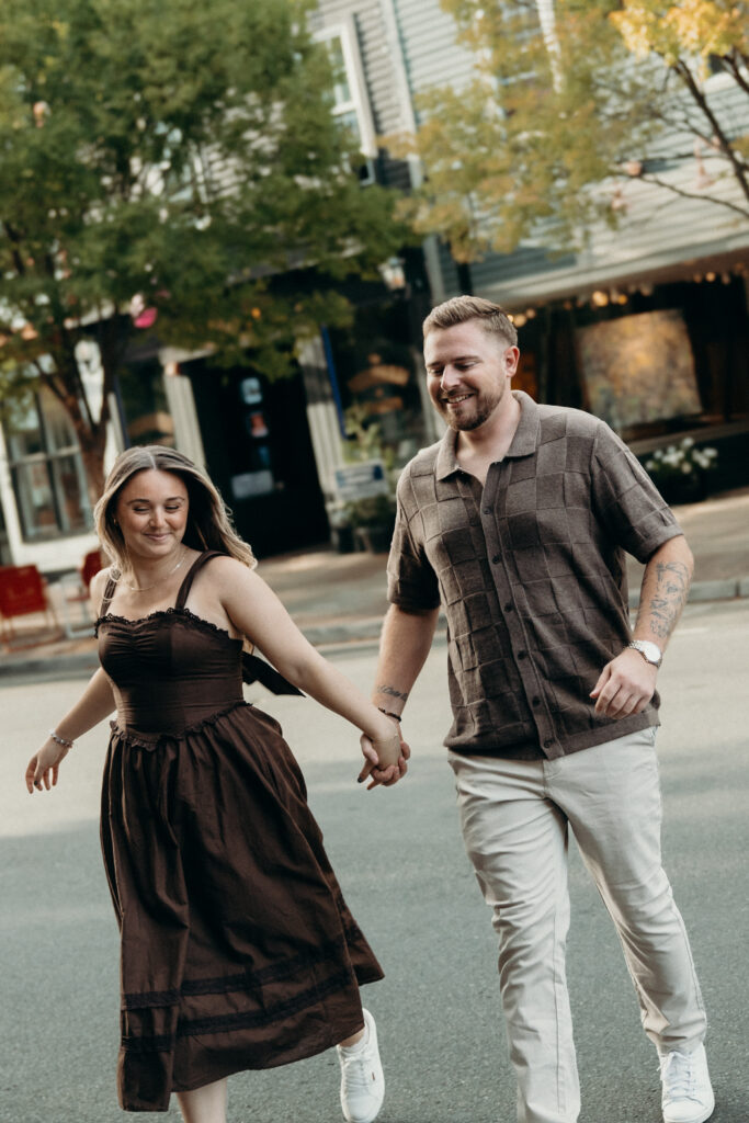 Engaged couple photographed at jersey shore by a brooklyn wedding photographer