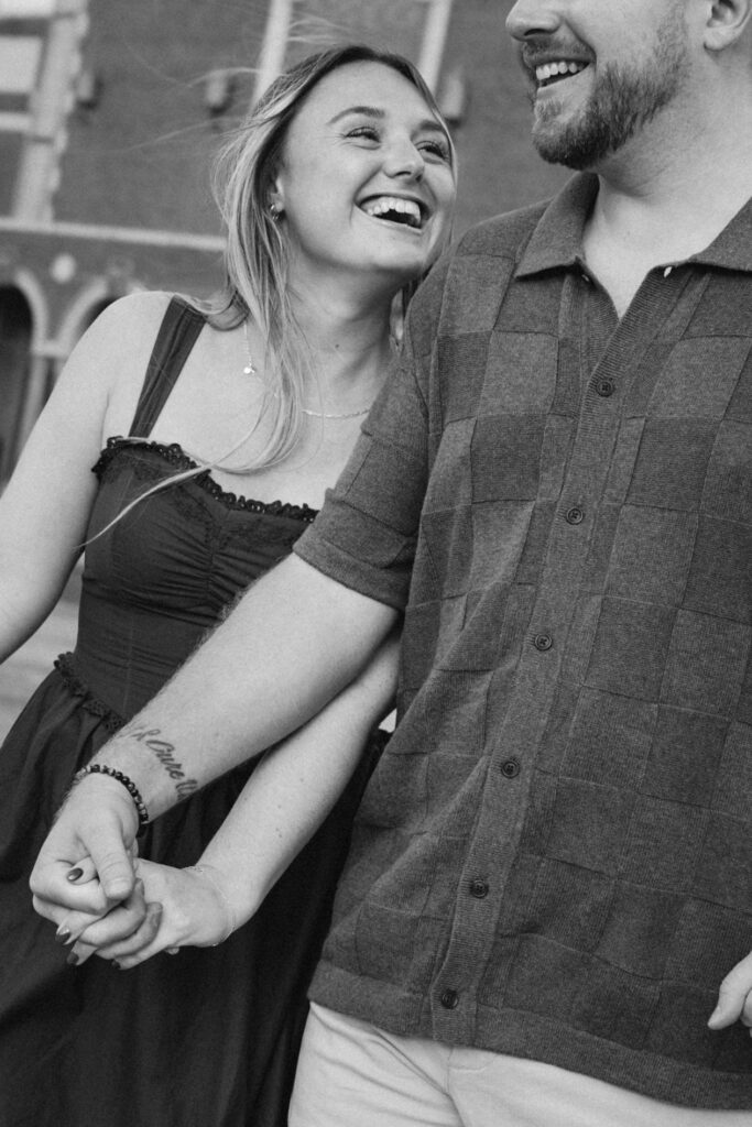 Engaged couple photographed at jersey shore by a brooklyn wedding photographer