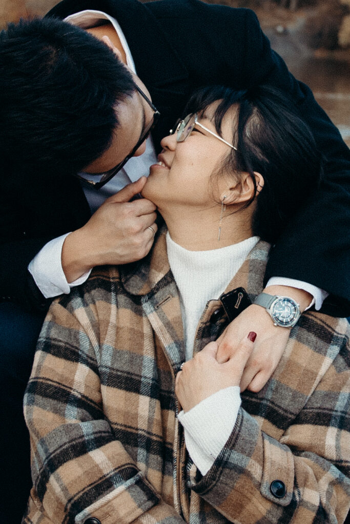 Engaged couple photographed at central park by a brooklyn wedding photographer