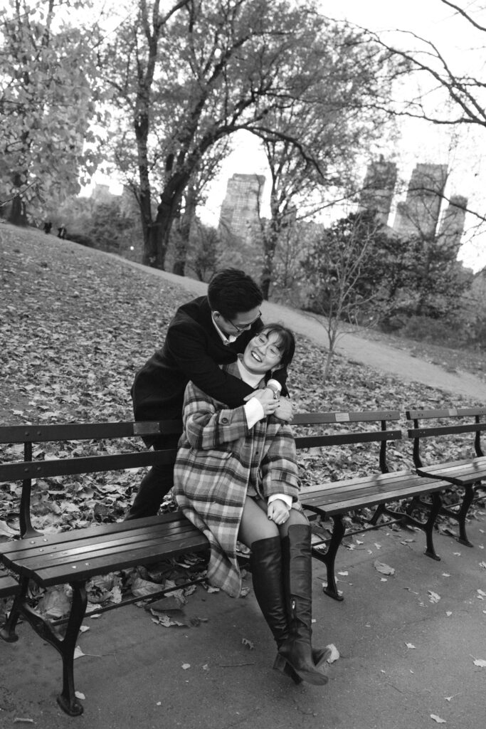 Engaged couple photographed at central park by a brooklyn wedding photographer