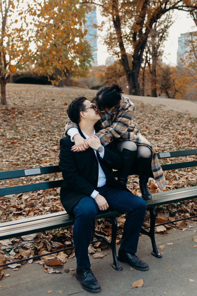 Engaged couple photographed at central park by a brooklyn wedding photographer