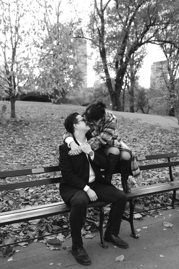 Engaged couple photographed at central park by a brooklyn wedding photographer