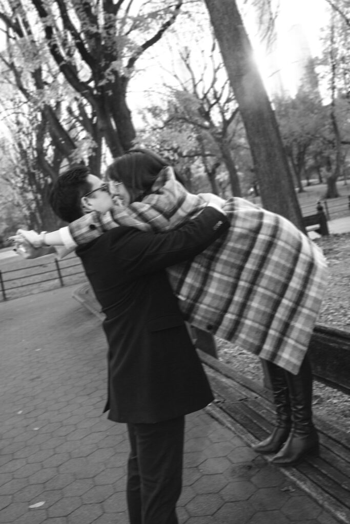 Engaged couple photographed at central park by a brooklyn wedding photographer