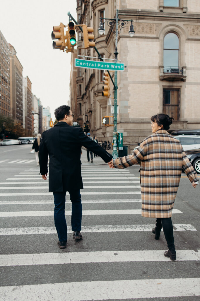 Engaged couple photographed at central park by a brooklyn wedding photographer