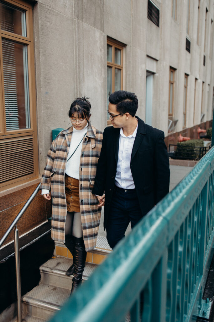 Engaged couple photographed at nyc subway by a brooklyn wedding photographer