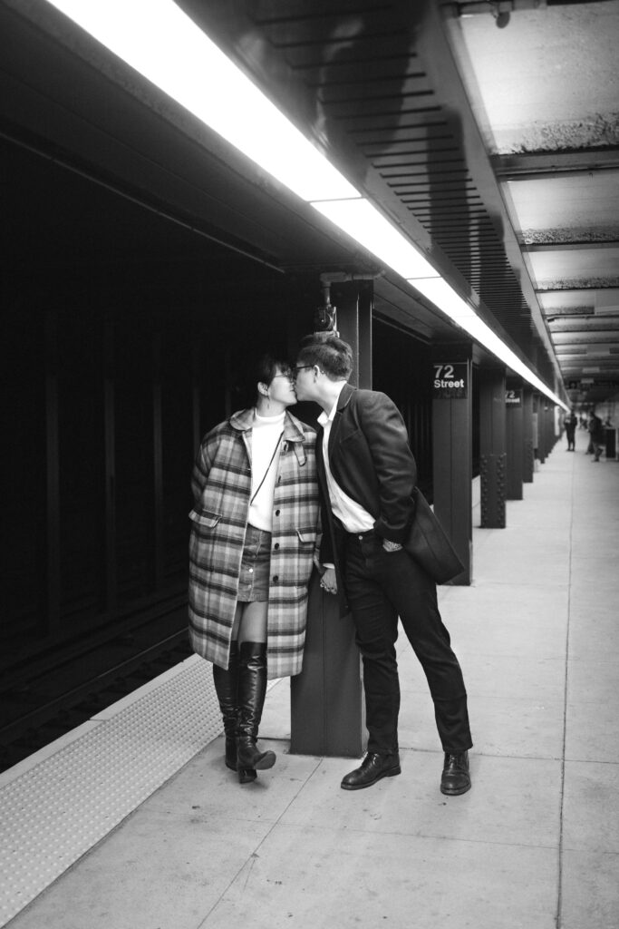 Engaged couple photographed at nyc subway by a brooklyn wedding photographer