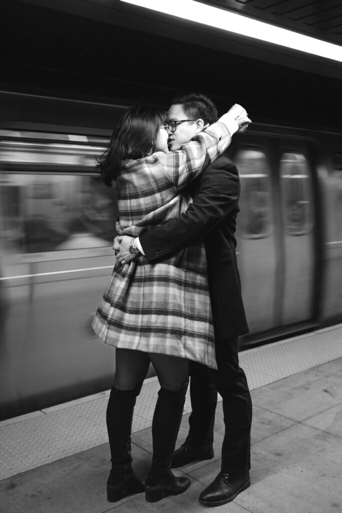 Engaged couple photographed at nyc subway by a brooklyn wedding photographer