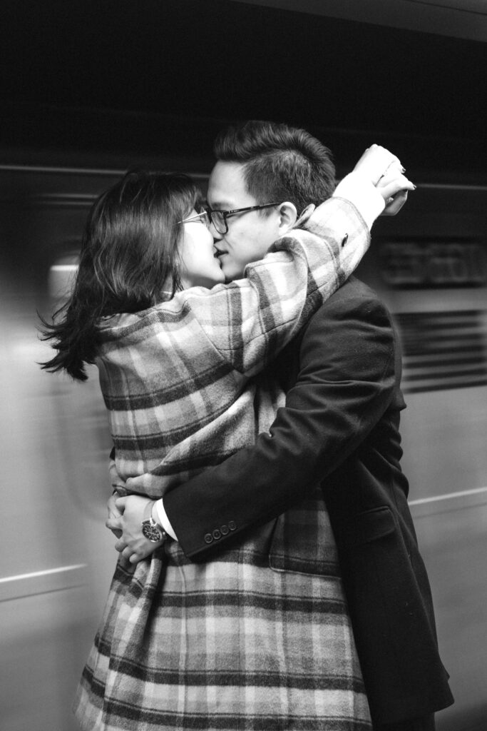 Engaged couple photographed at nyc subway by a brooklyn wedding photographer