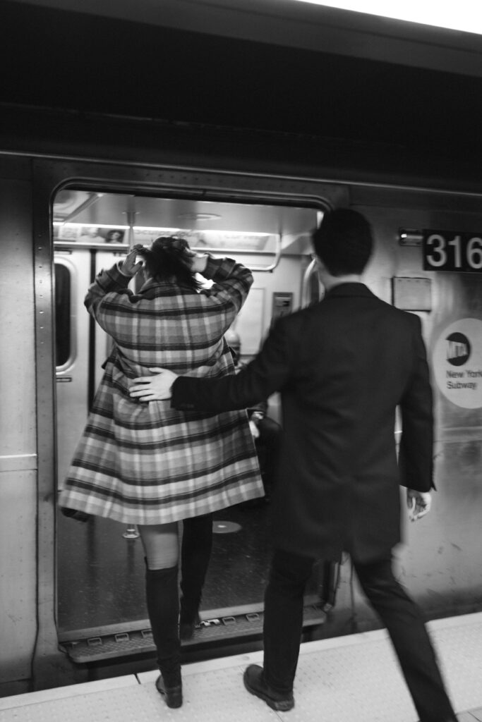 Engaged couple photographed at nyc subway by a brooklyn wedding photographer