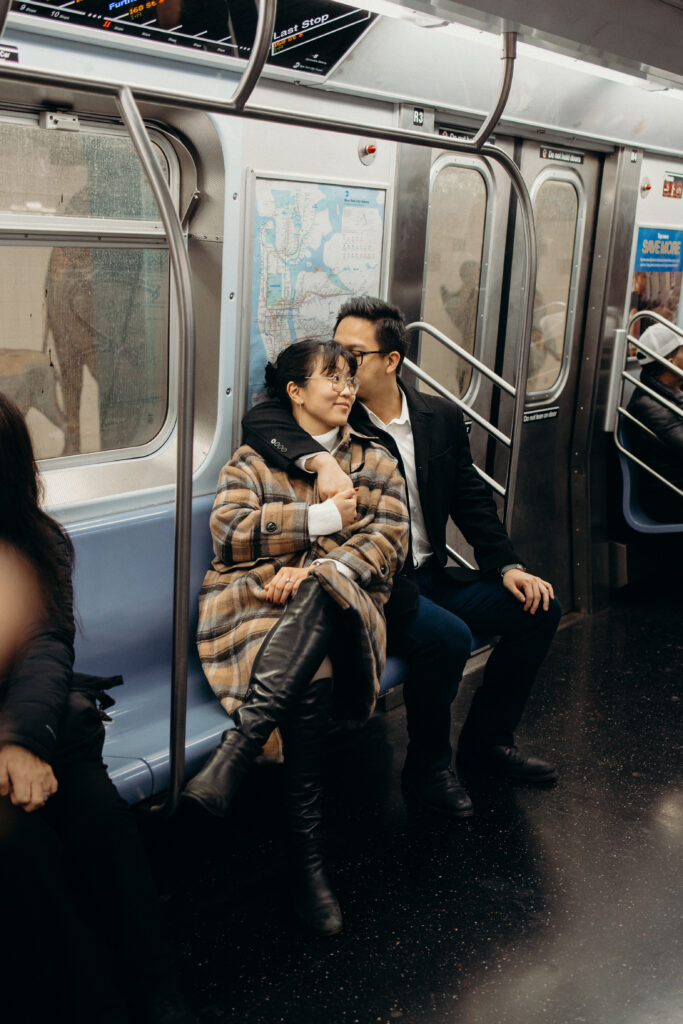 Engaged couple photographed at nyc subway by a brooklyn wedding photographer