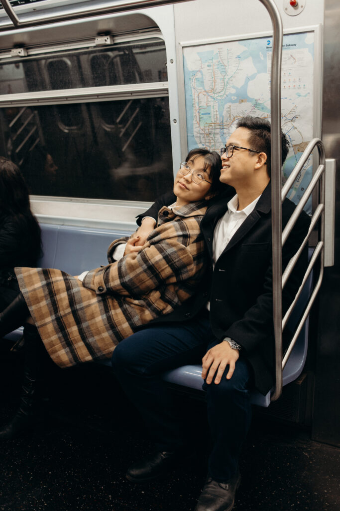 Engaged couple photographed at nyc subway by a brooklyn wedding photographer