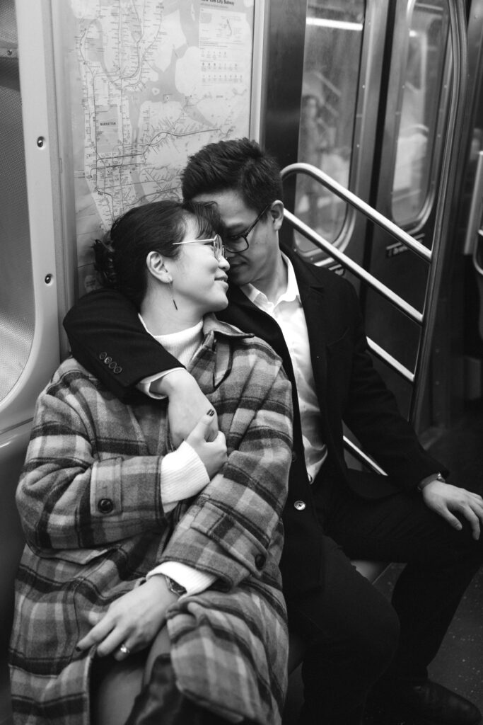 Engaged couple photographed at nyc subway by a brooklyn wedding photographer