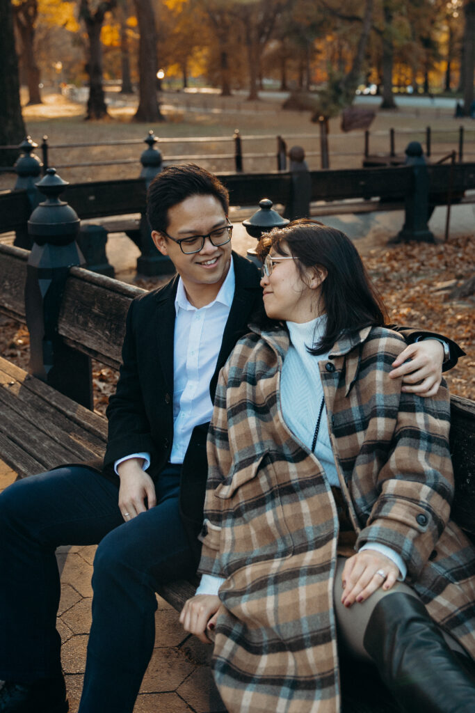 Engaged couple photographed at central park by a brooklyn wedding photographer