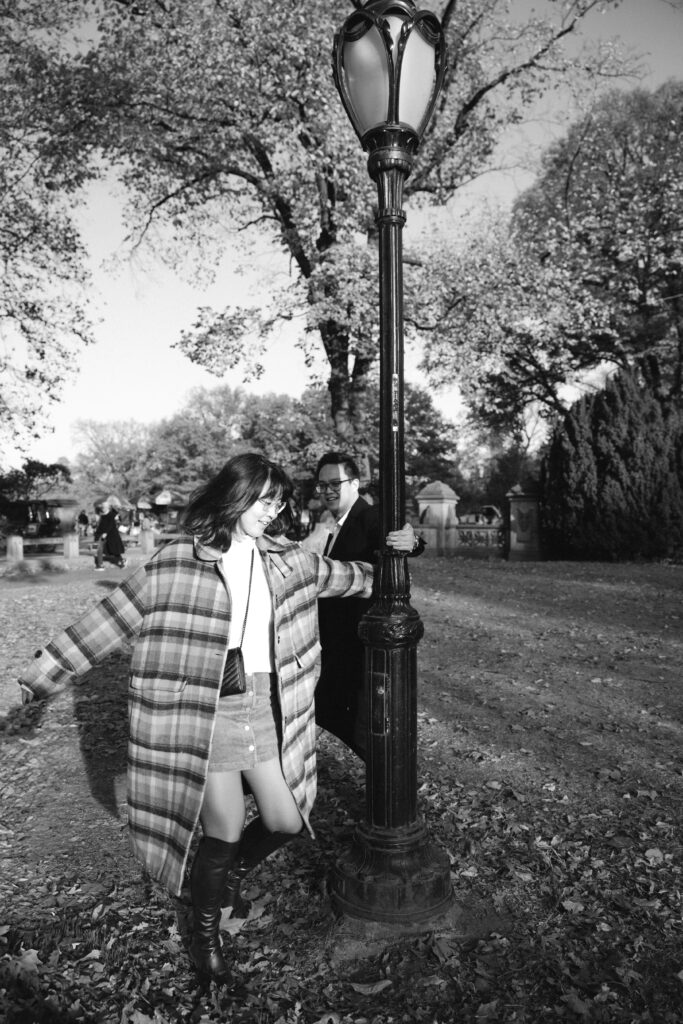 Engaged couple photographed at central park by a brooklyn wedding photographer