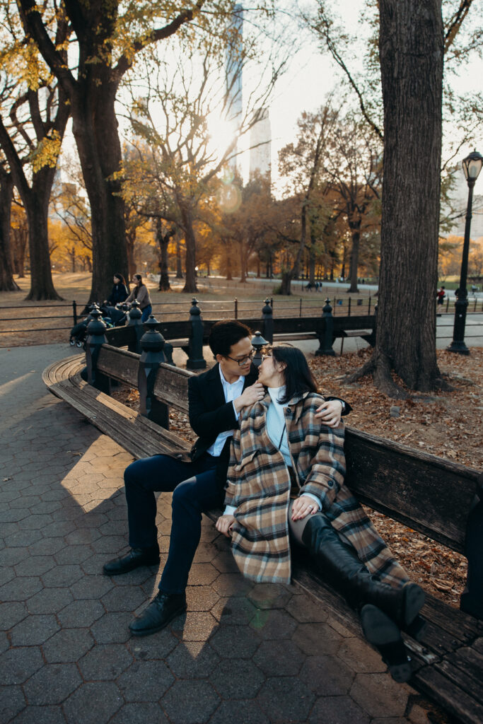 Engaged couple photographed at central park by a brooklyn wedding photographer