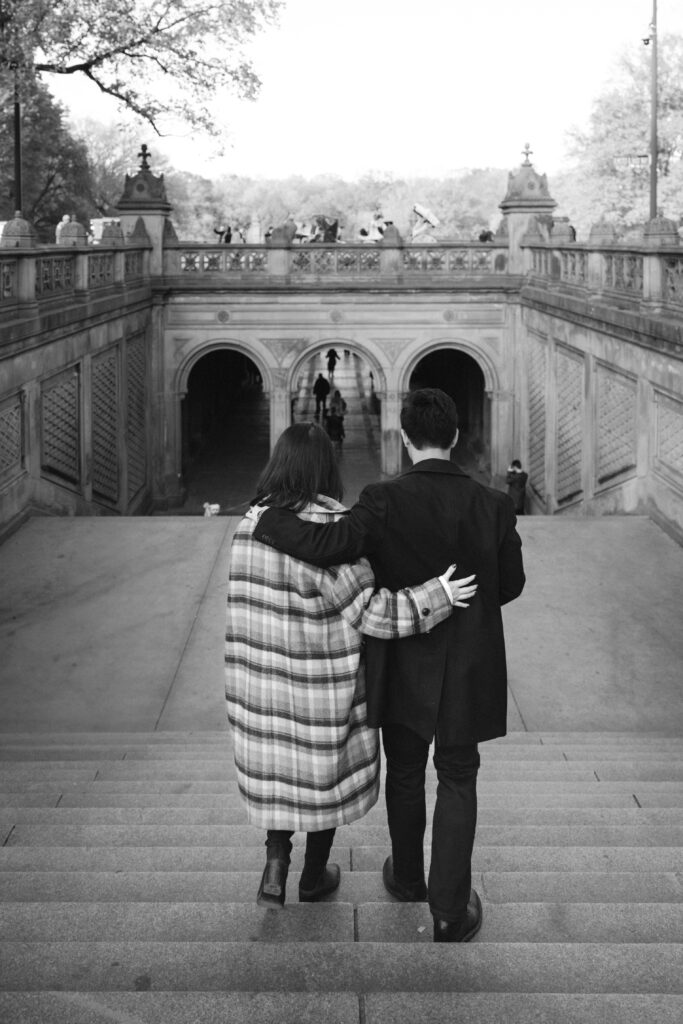 Engaged couple photographed at central park by a brooklyn wedding photographer