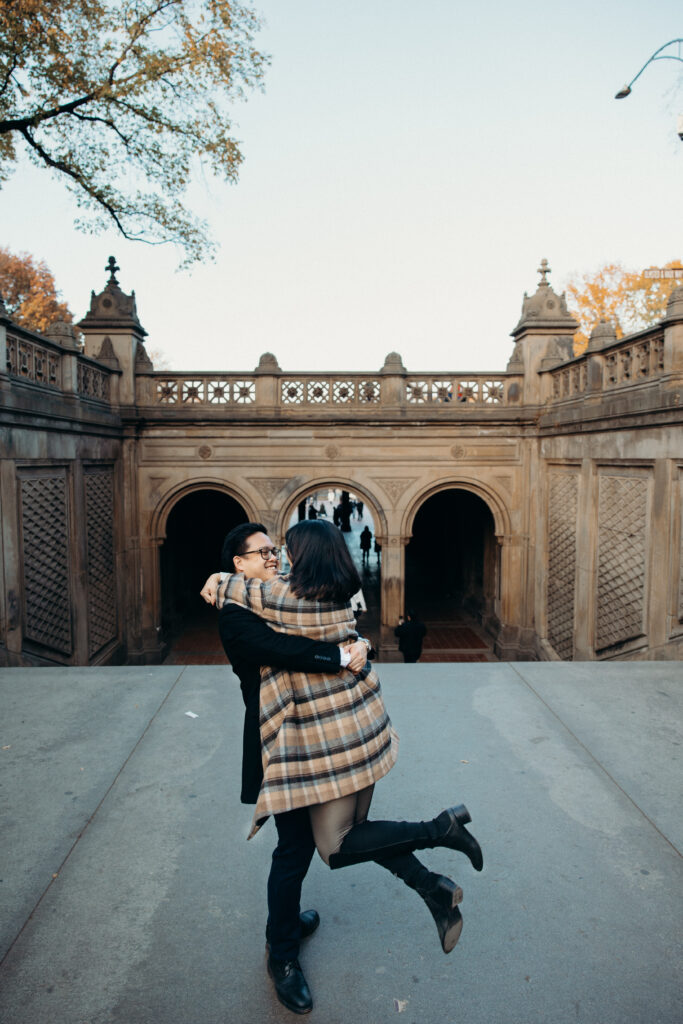 Engaged couple photographed at central park by a brooklyn wedding photographer