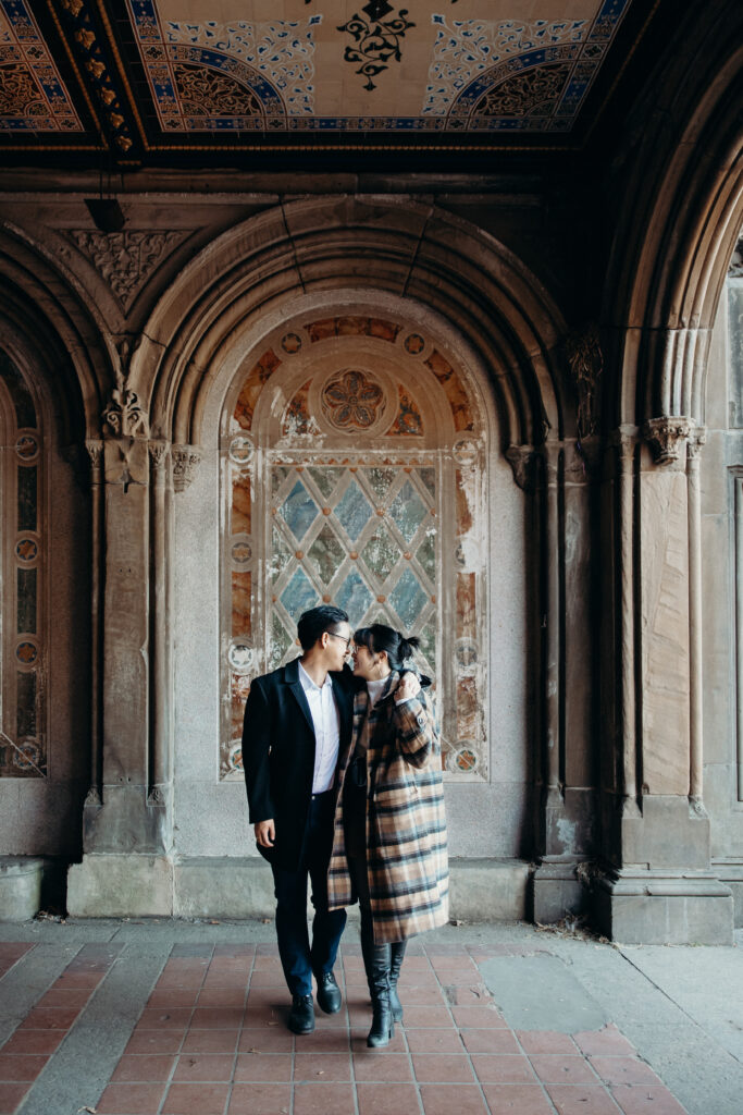 Engaged couple photographed at central park by a brooklyn wedding photographer