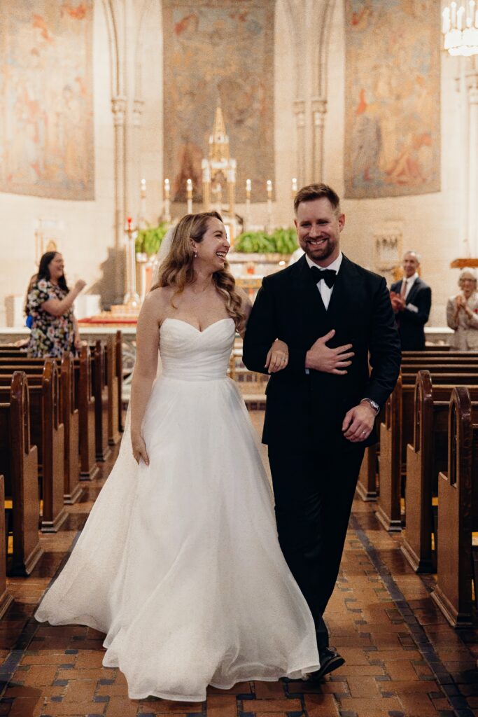 Bride and groom walk down the aisle at new york city elopement venue upper west side