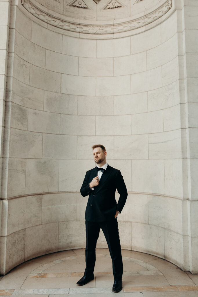 Groom photographed at upper west side by brooklyn elopement photographer