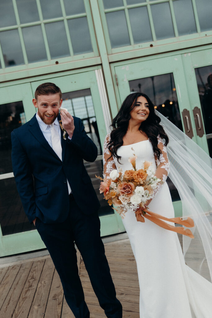 Couple photographed at asbury park by new jersey wedding photographer