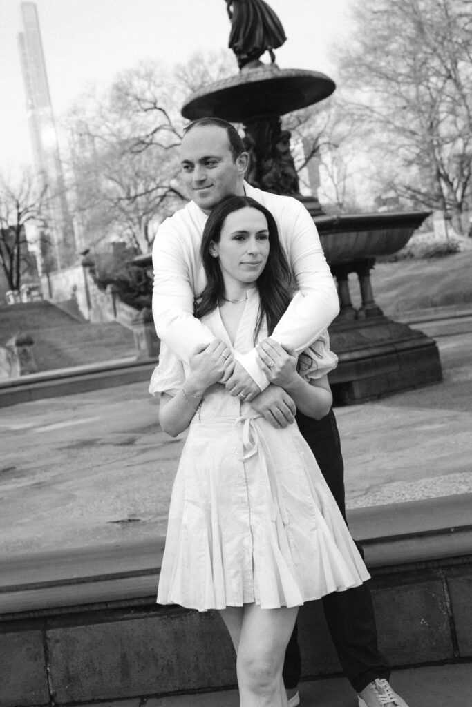 Engaged couple photographed at central park by a new york engagement photographer