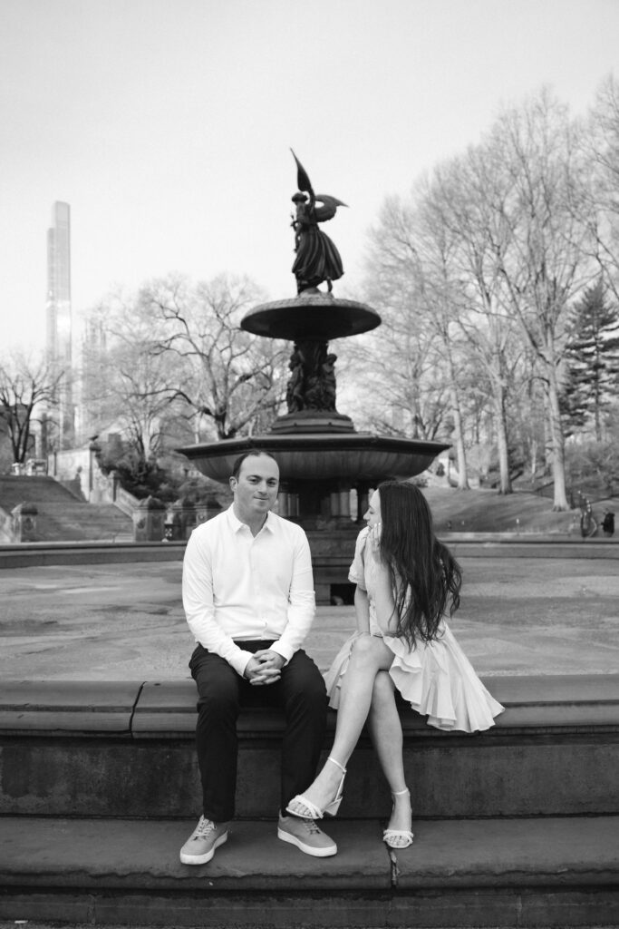 Engaged couple photographed at central park by a new york engagement photographer