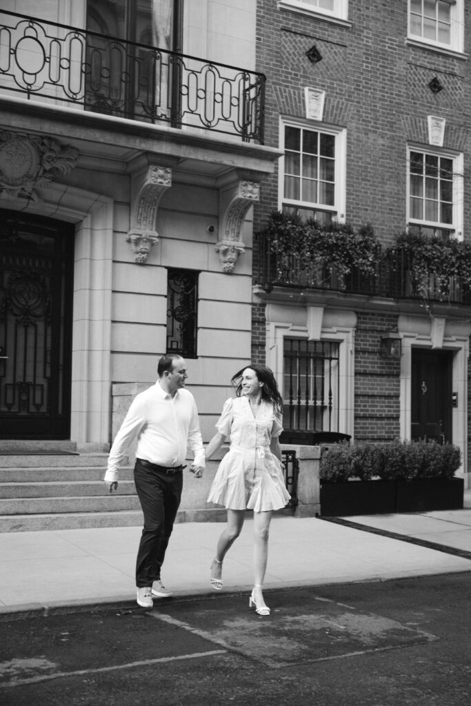 Engaged couple photographed at upper east side by a new york engagement photographer