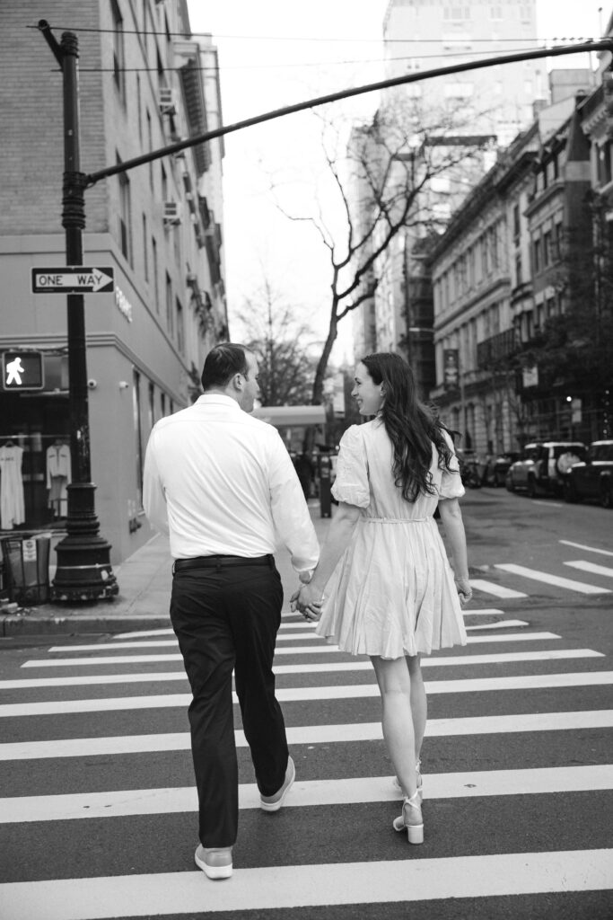 Engaged couple photographed at upper east side by a new york engagement photographer
