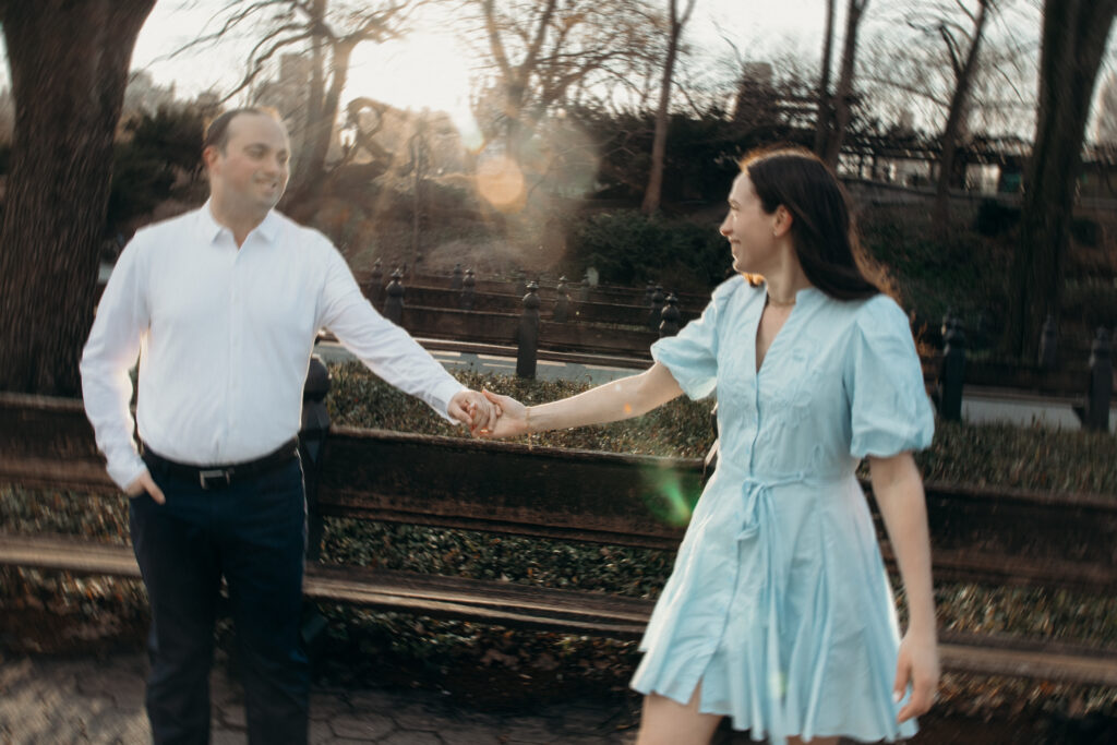 Engaged couple photographed at central park by a new york engagement photographer