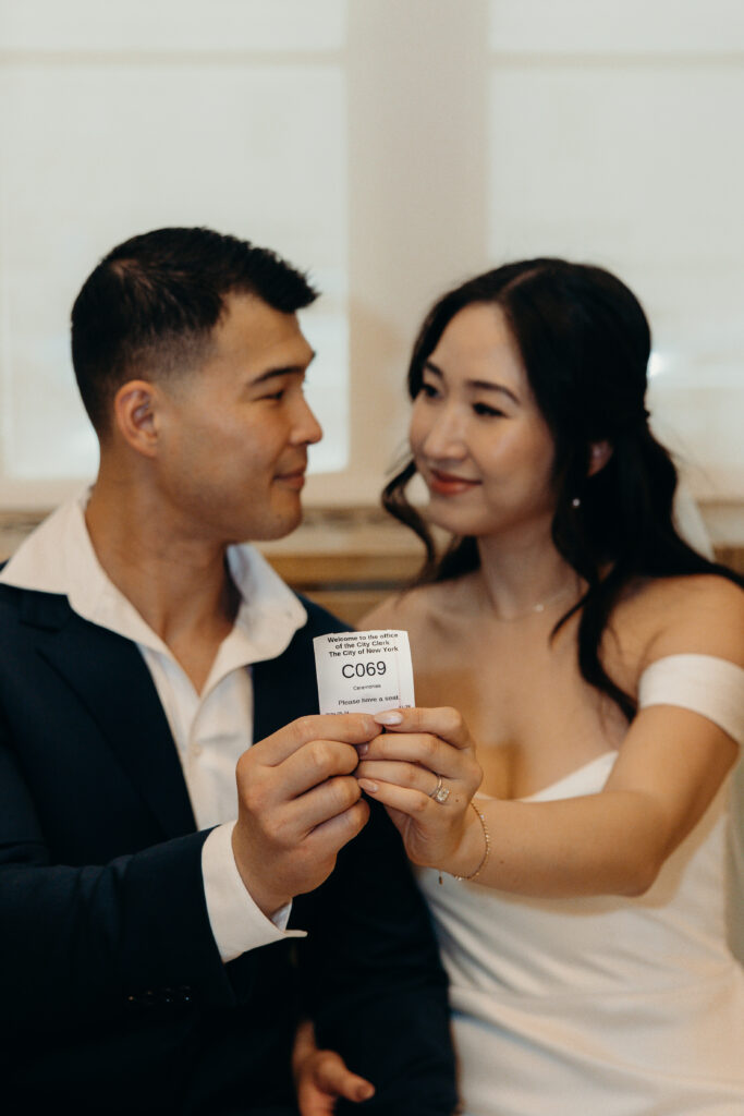 Couple waits for their elopement ceremony at nyc city hall