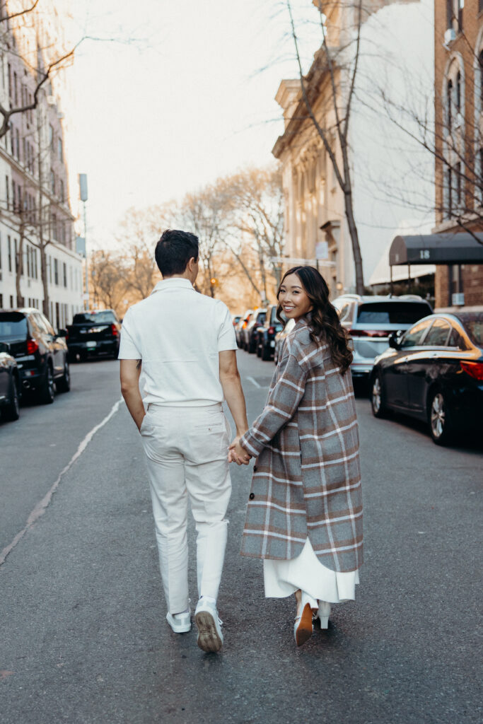 Engaged couple photographed at upper west side by a new york engagement photographer