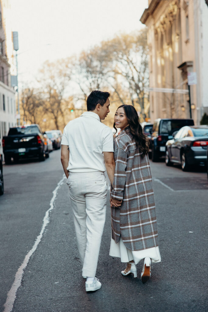 Engaged couple photographed at upper west side by a new york engagement photographer