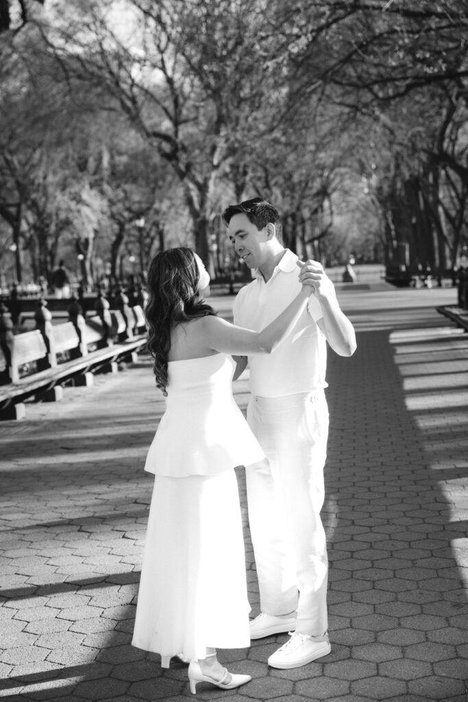 Engaged couple photographed at central park by a new york engagement photographer