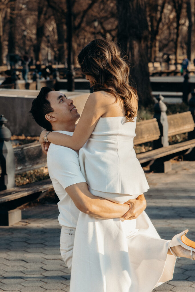Engaged couple photographed at central park by a new york engagement photographer