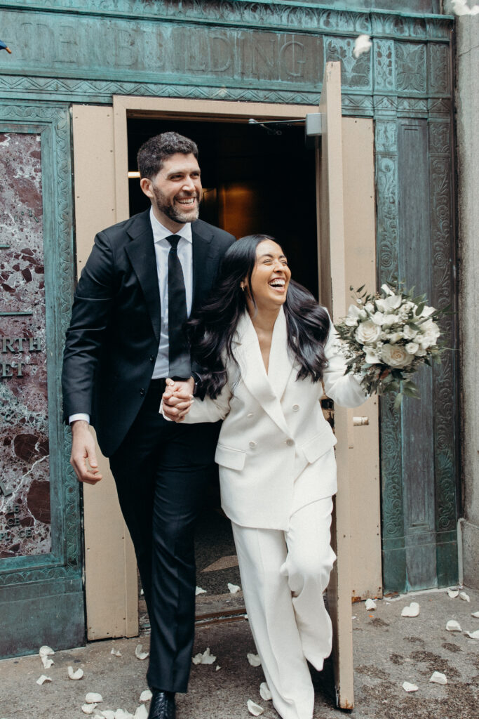 Couple photographed at nyc city hall by nyc elopement photographer