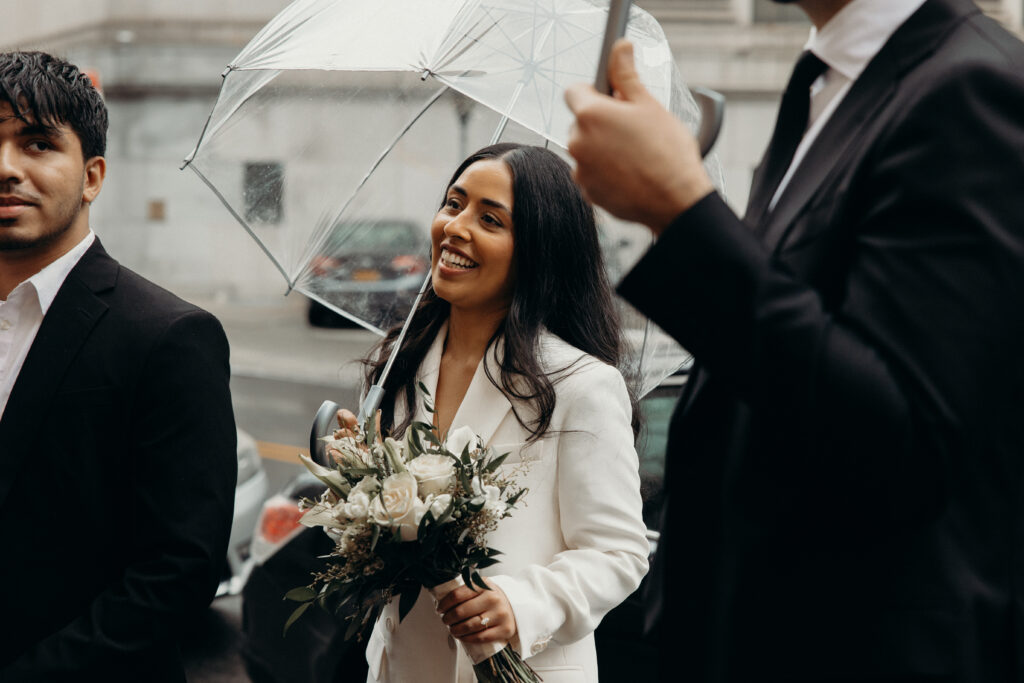 Couple photographed at nyc city hall by nyc elopement photographer