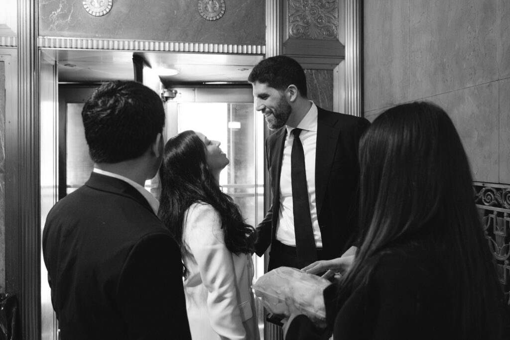 Couple photographed at nyc city hall by nyc elopement photographer