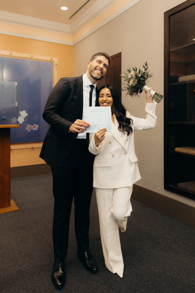 Couple photographed at nyc city hall by nyc elopement photographer
