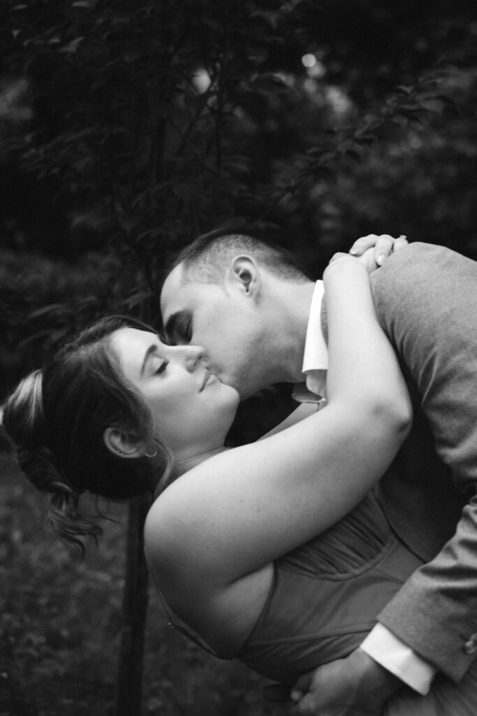 Couple dances during an engagement session in Sunnyside