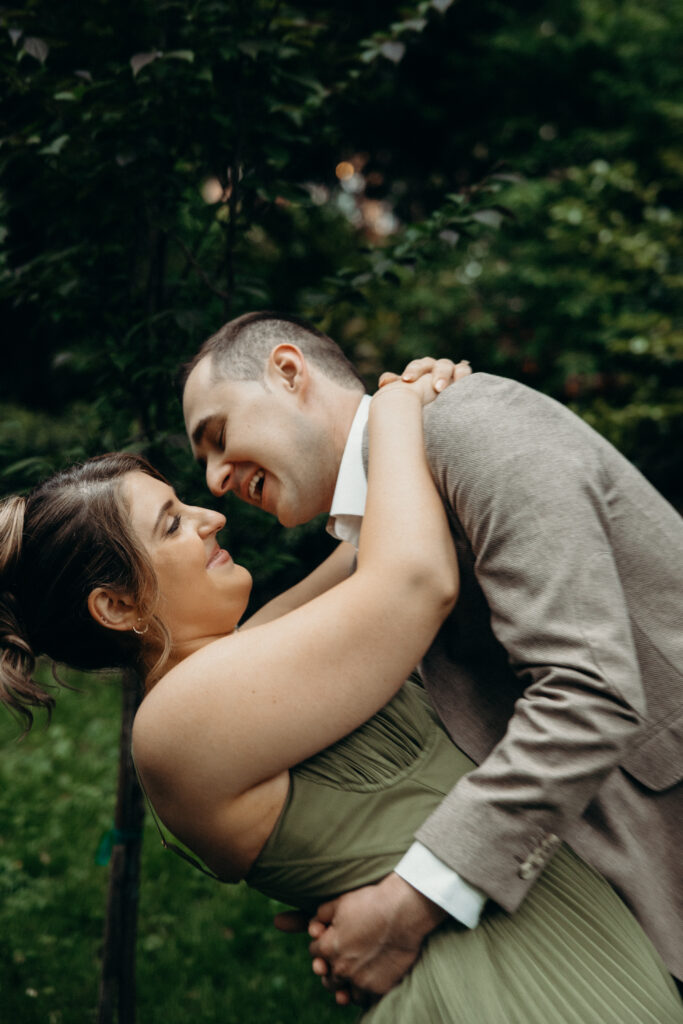Couple dances during an engagement session in Sunnyside