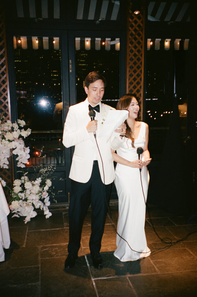 NYC wedding photographer captures evening reception at The River Café NYC