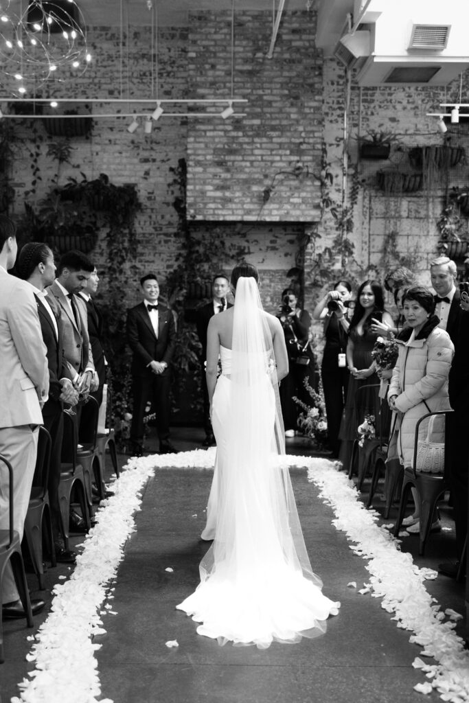 Bride walks down the aisle at Brooklyn Winery
