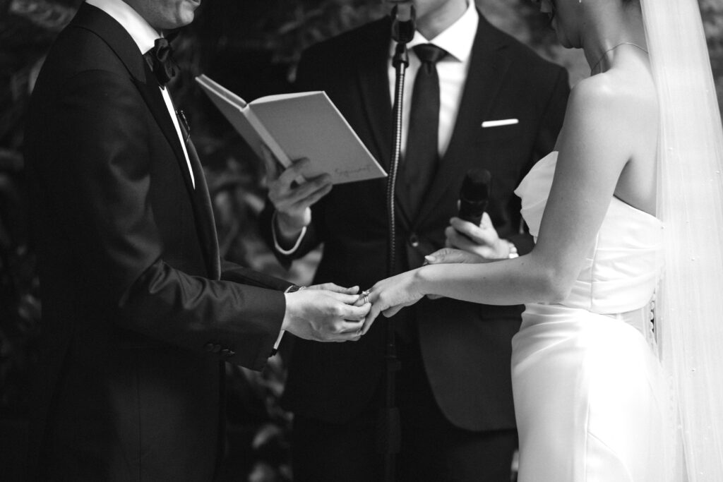 Bride and groom exchange rings at Brooklyn Winery