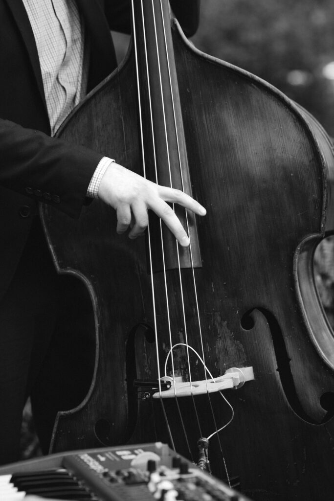 Musician playing an instrument during cocktail hour at The River Café wedding in NYC