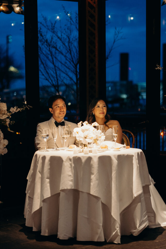 NYC wedding photographer captures evening reception at The River Café NYC